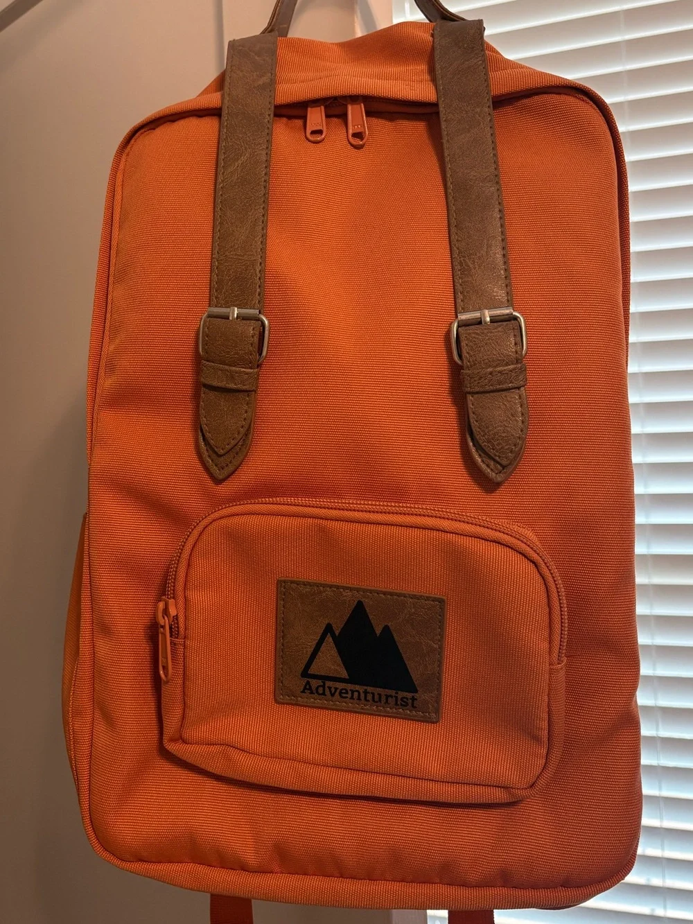 Orange Canvas Backpack with Brown Accents